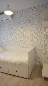 Posteľ alebo postele v izbe v ubytovaní Cute Central Apartment