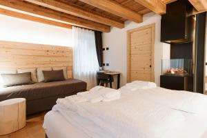 Postel nebo postele na pokoji v ubytování Pimont Alpine Chalet