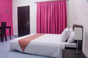 Hotel Djigui客房内的一张或多张床位