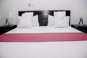 Hotel Djigui客房内的一张或多张床位