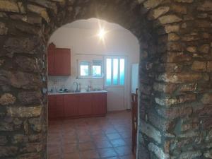 Kuchyň nebo kuchyňský kout v ubytování Antonia's Rustic Retreat