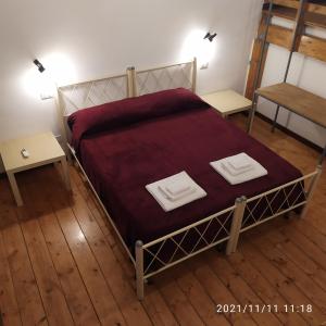 Posteľ alebo postele v izbe v ubytovaní Il Castello Apartment