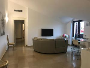 TV a/nebo společenská místnost v ubytování Maria Ancona suite