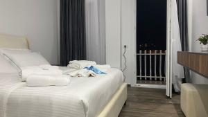 Postel nebo postele na pokoji v ubytování Bujtina Xhabakja