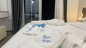 Postel nebo postele na pokoji v ubytování Bujtina Xhabakja