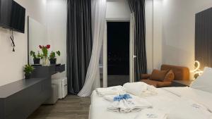 Postel nebo postele na pokoji v ubytování Bujtina Xhabakja