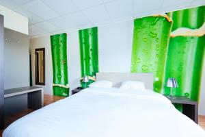 Postelja oz. postelje v sobi nastanitve Hotel Soret
