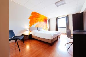 Postelja oz. postelje v sobi nastanitve Hotel Soret