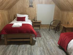 Un pat sau paturi într-o cameră la Casa Rural 32
