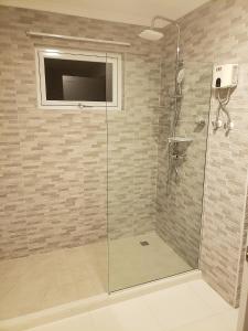 Ένα μπάνιο στο Aruba Vacation House - Cozy and Modern!