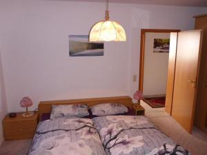 Postel nebo postele na pokoji v ubytování Ferienwohnung-Rita