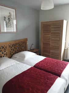 Postel nebo postele na pokoji v ubytování Attic pour 4 personnes