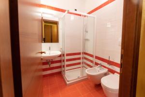 Koupelna v ubytování Hotel Enzo Moro