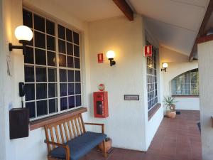 Posezení v ubytování McNevins Warwick Motel