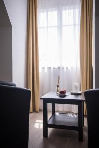 Posezení v ubytování Max Aviation Villa & Apartments