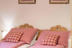 Ein Bett oder Betten in einem Zimmer der Unterkunft Ferienapartments Forst Kienberg