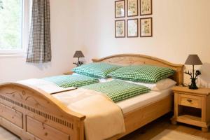 Łóżko lub łóżka w pokoju w obiekcie Apartments Kienberg