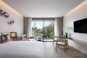 Postel nebo postele na pokoji v ubytování Avani Plus Khao Lak Resort