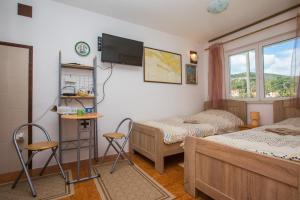 Postel nebo postele na pokoji v ubytování Seaside Studio