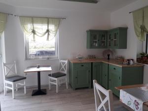 Kjøkken eller kjøkkenkrok på Eifelpension-Radlertraum