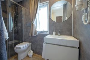 Koupelna v ubytování Camping Porto srl
