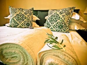 Ένα ή περισσότερα κρεβάτια σε δωμάτιο στο The Kraal Addo