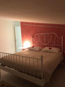 Postel nebo postele na pokoji v ubytování Tavern di Arqua'