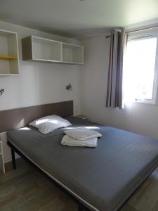 Postel nebo postele na pokoji v ubytování Camping Via Romana + 37 fotografií