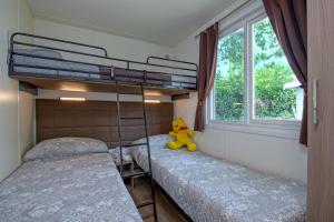 Postel nebo postele na pokoji v ubytování Camping Porto srl + 37 fotografií