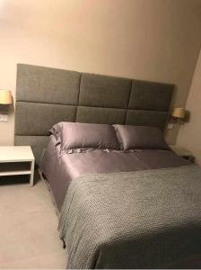 A bed or beds in a room at Orta Paradise 26