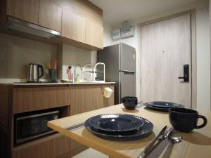 Kuchyň nebo kuchyňský kout v ubytování La Casita Hua Hin by Holiyay