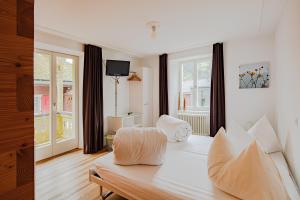 TV a/nebo společenská místnost v ubytování Hotel Vallatscha