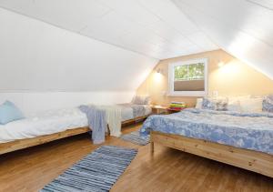 Een bed of bedden in een kamer bij Lapite
