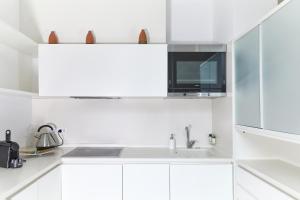 Kuchyň nebo kuchyňský kout v ubytování Prestige Boutique Homes-Duomo + 27 fotografií