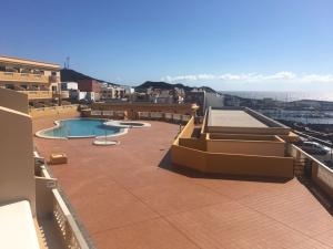 a view of a roof of a building with a swimming pool at Apto Tagoro, La Restinga in La Restinga