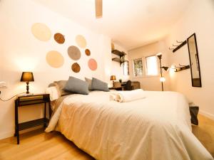 Łóżko lub łóżka w pokoju w obiekcie Apartamento Aliaga