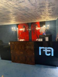 a desk in a room with a sign on the wall at TM Luxury Apartments Lisbon in Lisbon +223 photos