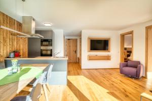 Kuchyň nebo kuchyňský kout v ubytování HUS23 with Wellness