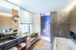 Kylpyhuone majoituspaikassa hirschen dornbirn - das boutiquestyle hotel