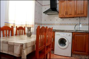 Kuchyň nebo kuchyňský kout v ubytování Apartamento Calle Bilbao