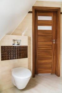 Kúpeľňa v ubytovaní Apartamenty Domino - Kościelisko + 37 fotografií
