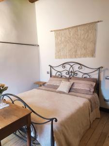 A bed or beds in a room at B&B I Martelli