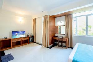 TV a/nebo společenská místnost v ubytování Noomoo Hulhumale