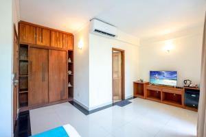 TV a/nebo společenská místnost v ubytování Noomoo Hulhumale