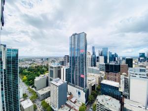 an aerial view of a city with tall buildings at The Escape in Southern Cross Station in Melbourne