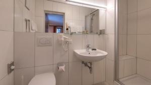 Koupelna v ubytování Haus Karl Murr + 21 fotografií