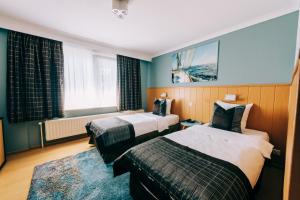Postel nebo postele na pokoji v ubytování Hotel De Kalvaar
