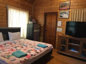 Postel nebo postele na pokoji v ubytování Diamond Resort