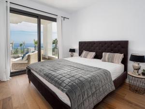 Voodi või voodid majutusasutuse The Links II 2323 Appartment with sea view toas