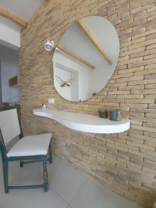 Kúpeľňa v ubytovaní Notus Suites